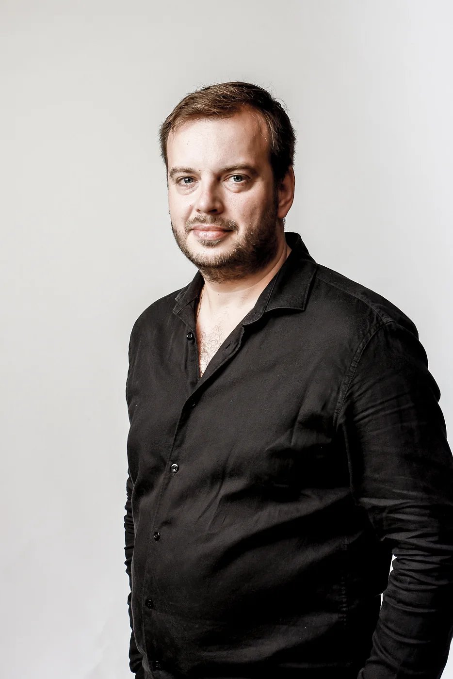 Portrait of Jiří Kabát against a light background
